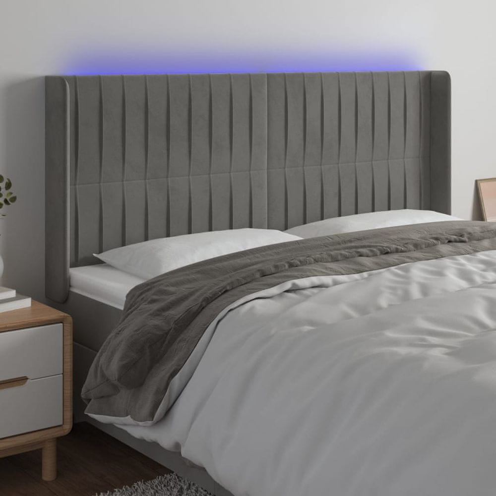 Vidaxl Čelo postele s LED bledosivé 203x16x118/128 cm zamat
